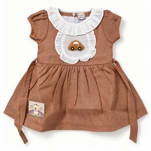 Brown baby dress with white ruffled collar, car applique and bear patch, front view