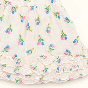 Pink and blue floral print and layered ruffles on ivory skirt