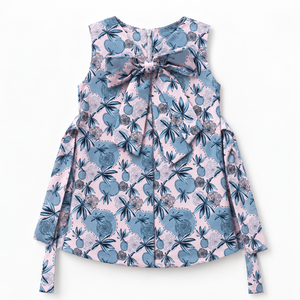 Studio back view of pink and blue botanical bow dress from Inaabia 4-dress combo set