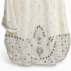 Ornate tunic hem detail