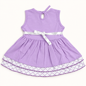 Back of lilac dress with satin waist ribbon