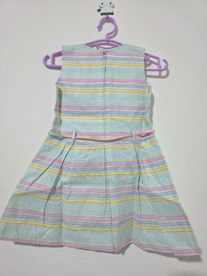 Original back view of pastel striped sleeveless girls dress showing center back zipper and pleated skirt