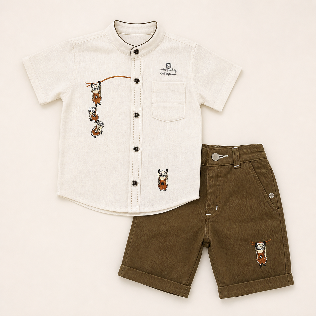 Boys cream embroidered shirt and brown shorts two-piece set flat lay