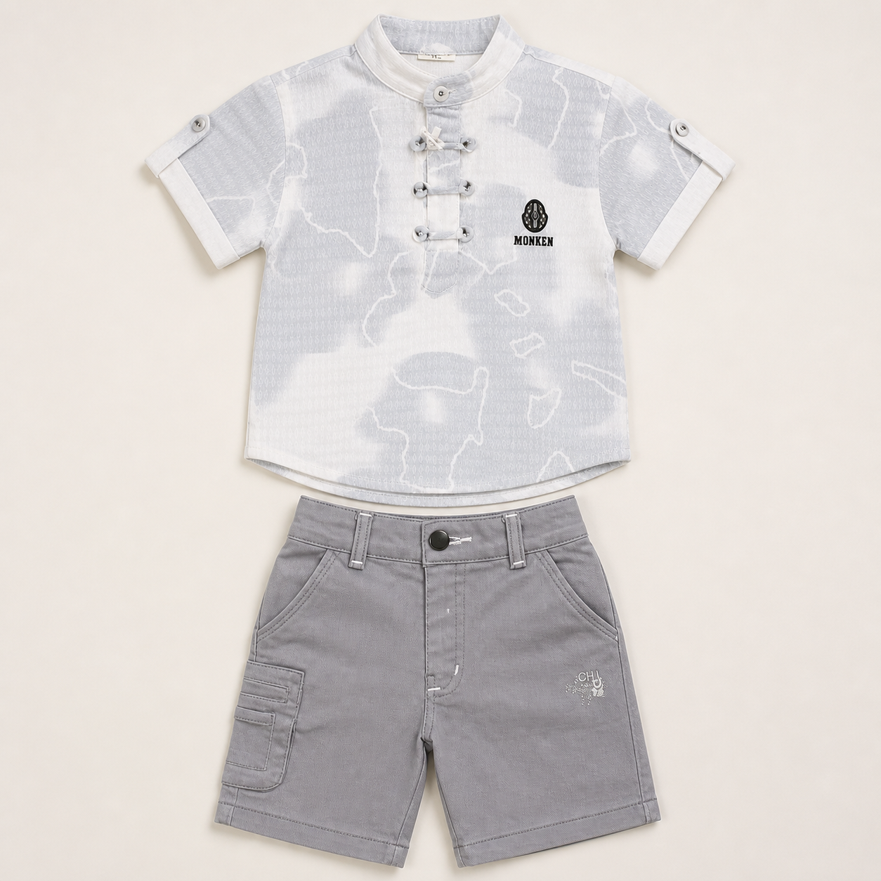 Boys grey patterned shirt and cargo shorts two-piece set flat lay