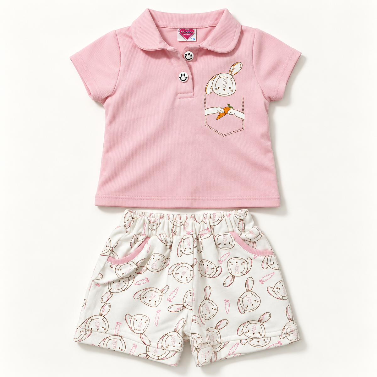 Pink bunny polo with two smiley buttons and matching ivory bunny-print shorts