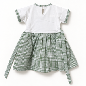 White and green checked baby dress back view with neckline opening and waist ties