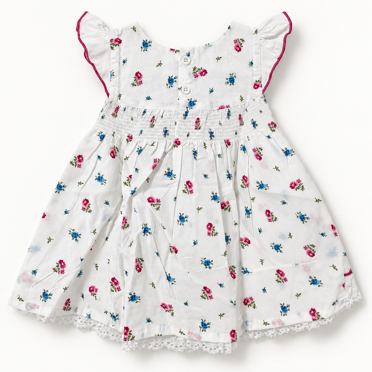 White floral baby dress back view showing two buttons and shirred waist
