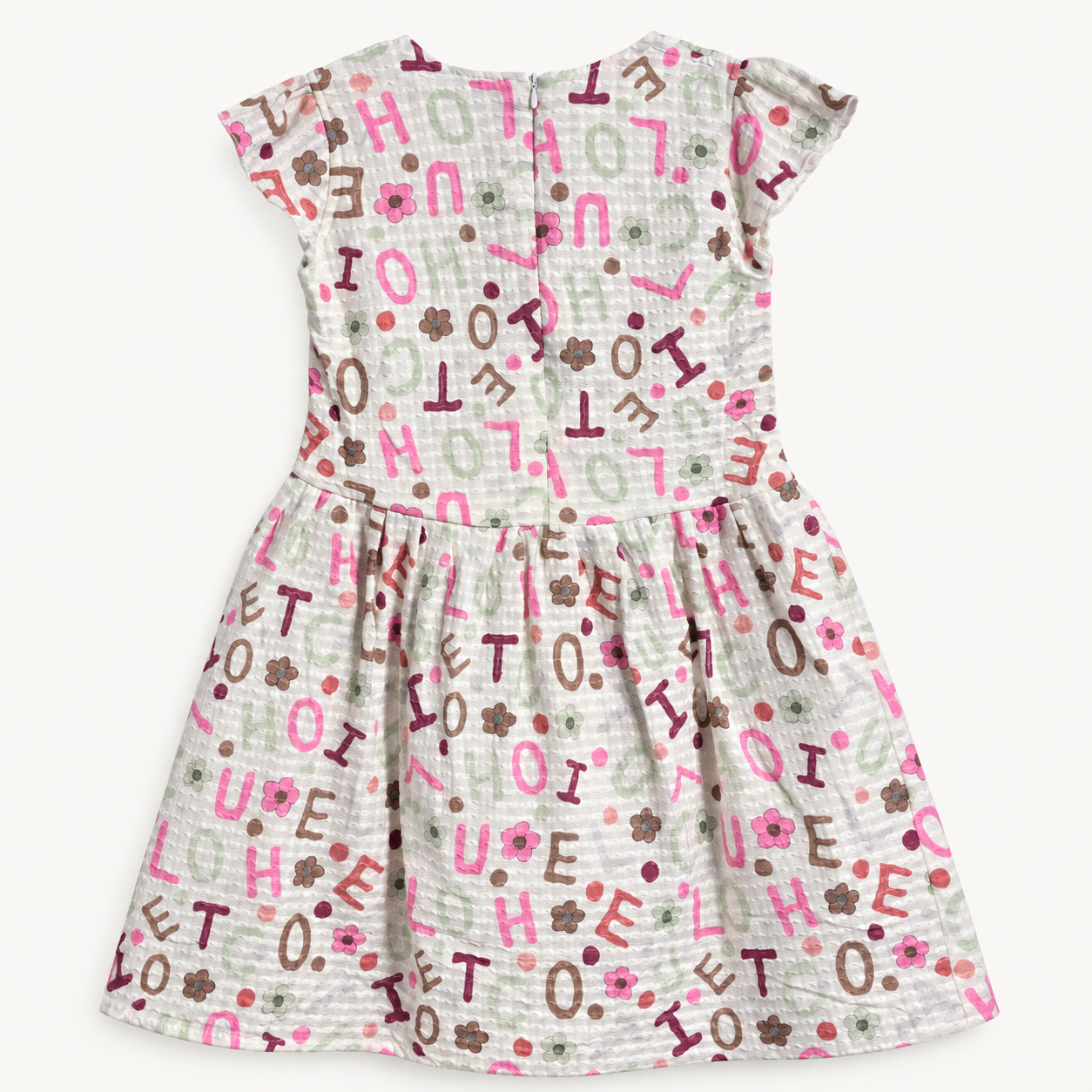 Back view of off-white alphabet and flower print girls dress with short sleeves and back zipper