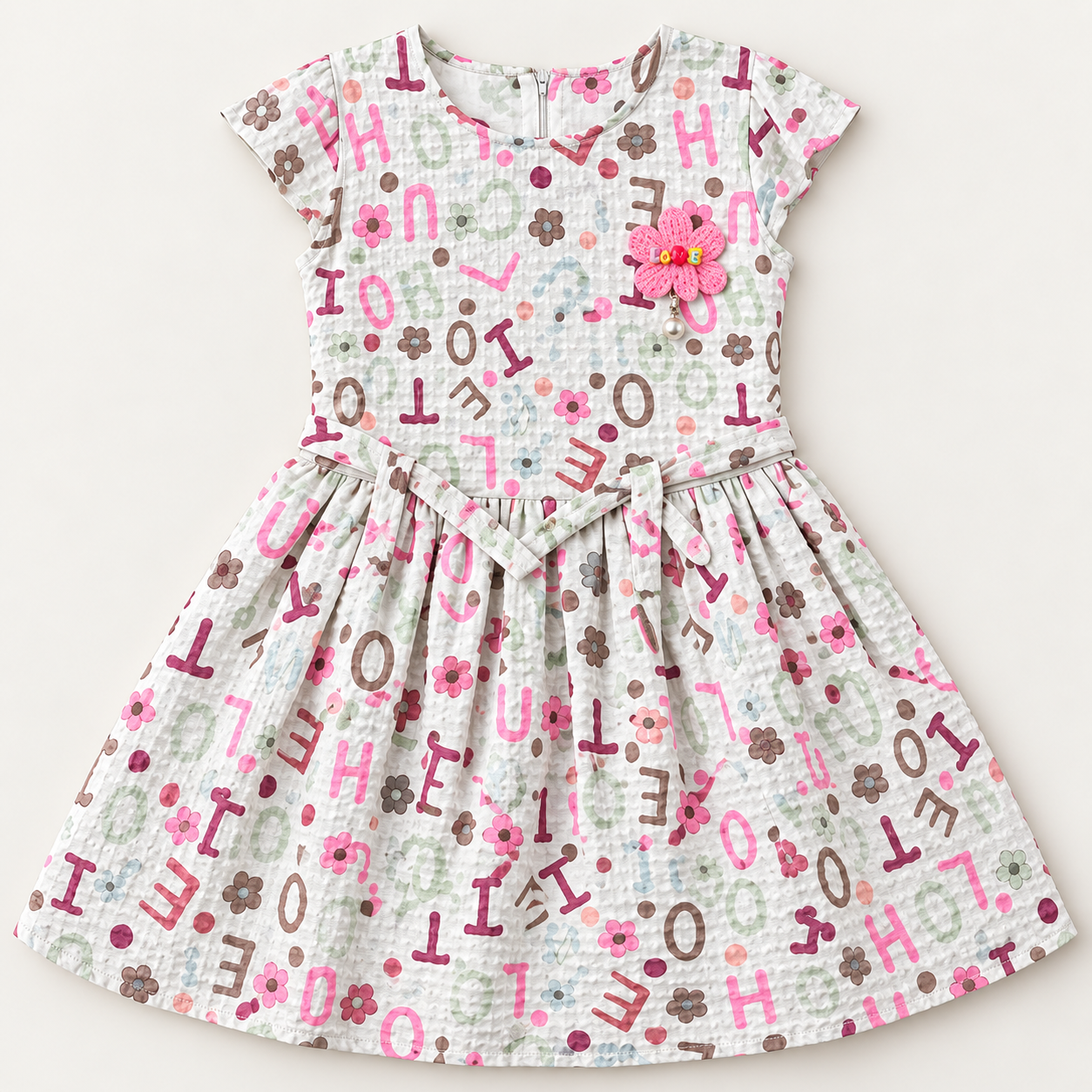 Off-white alphabet and flower print girls dress with pink LOVE flower applique and waist tie