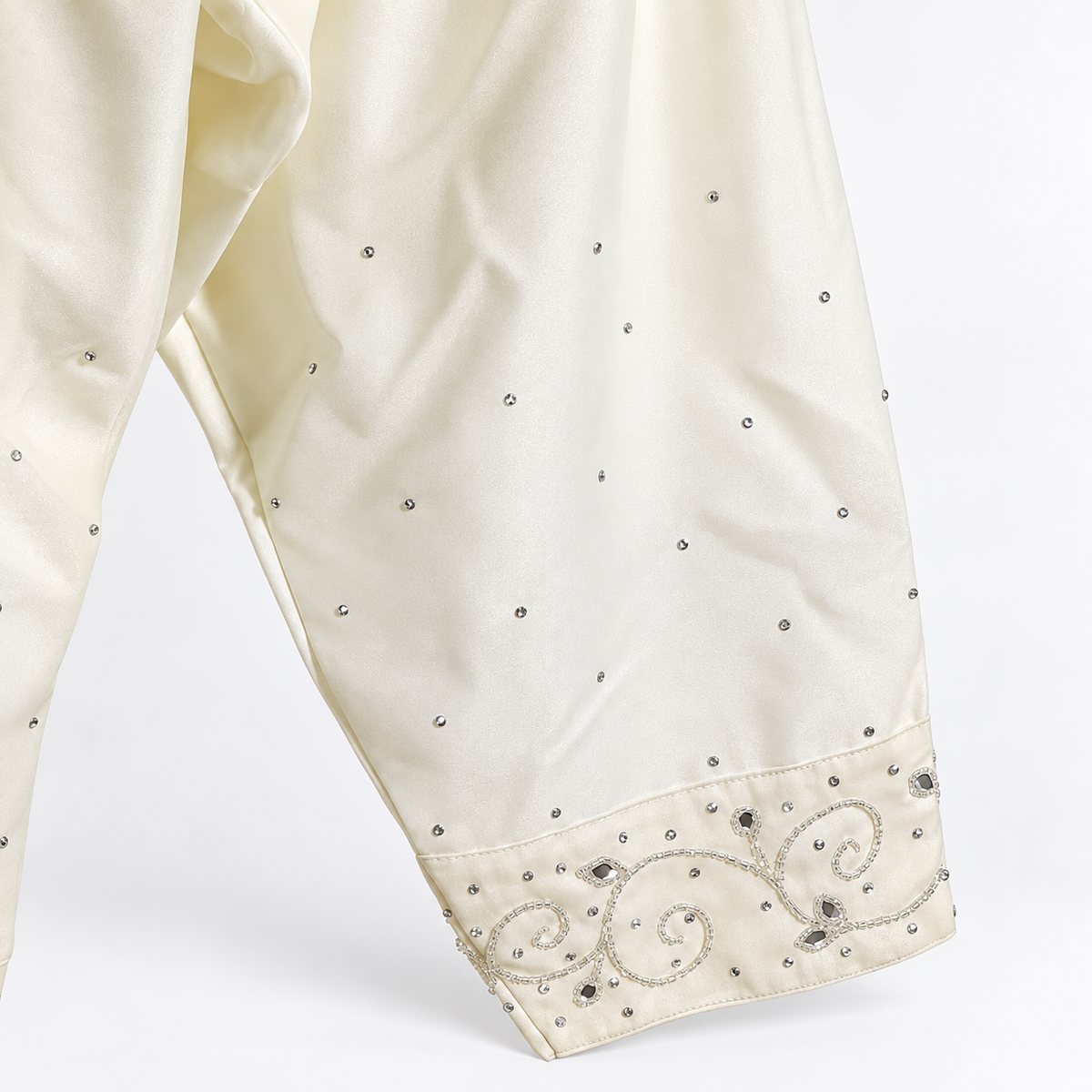 Trouser cuff embellishment detail
