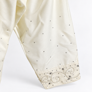 Trouser cuff embellishment detail