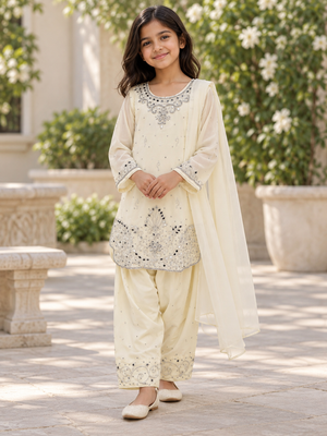 AI model wearing cream outfit in garden courtyard