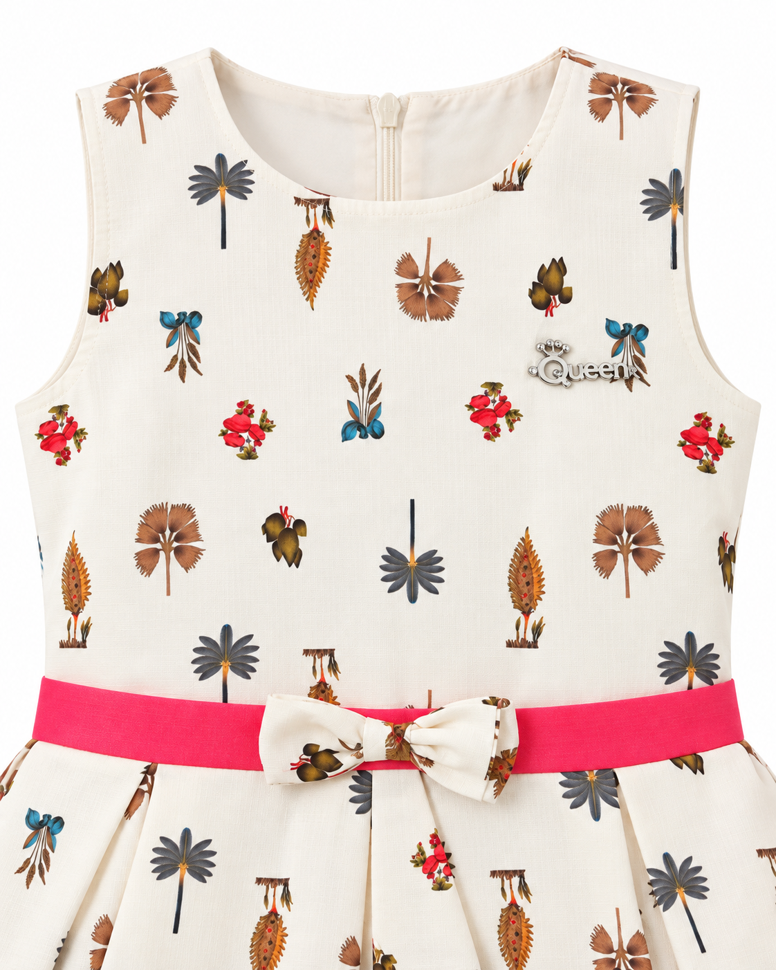 Studio front view of Inaabia ivory botanical girls dress with pink sash and Queen chest detail