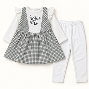 Fine dark checked bunny tunic with long white sleeves and white trousers