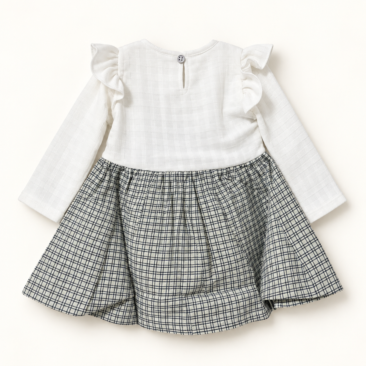 Back of checked bunny tunic with white bodice, shoulder ruffles and long sleeves