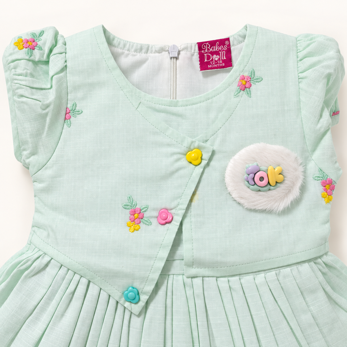 Mint dress flower buttons and embroidery detail