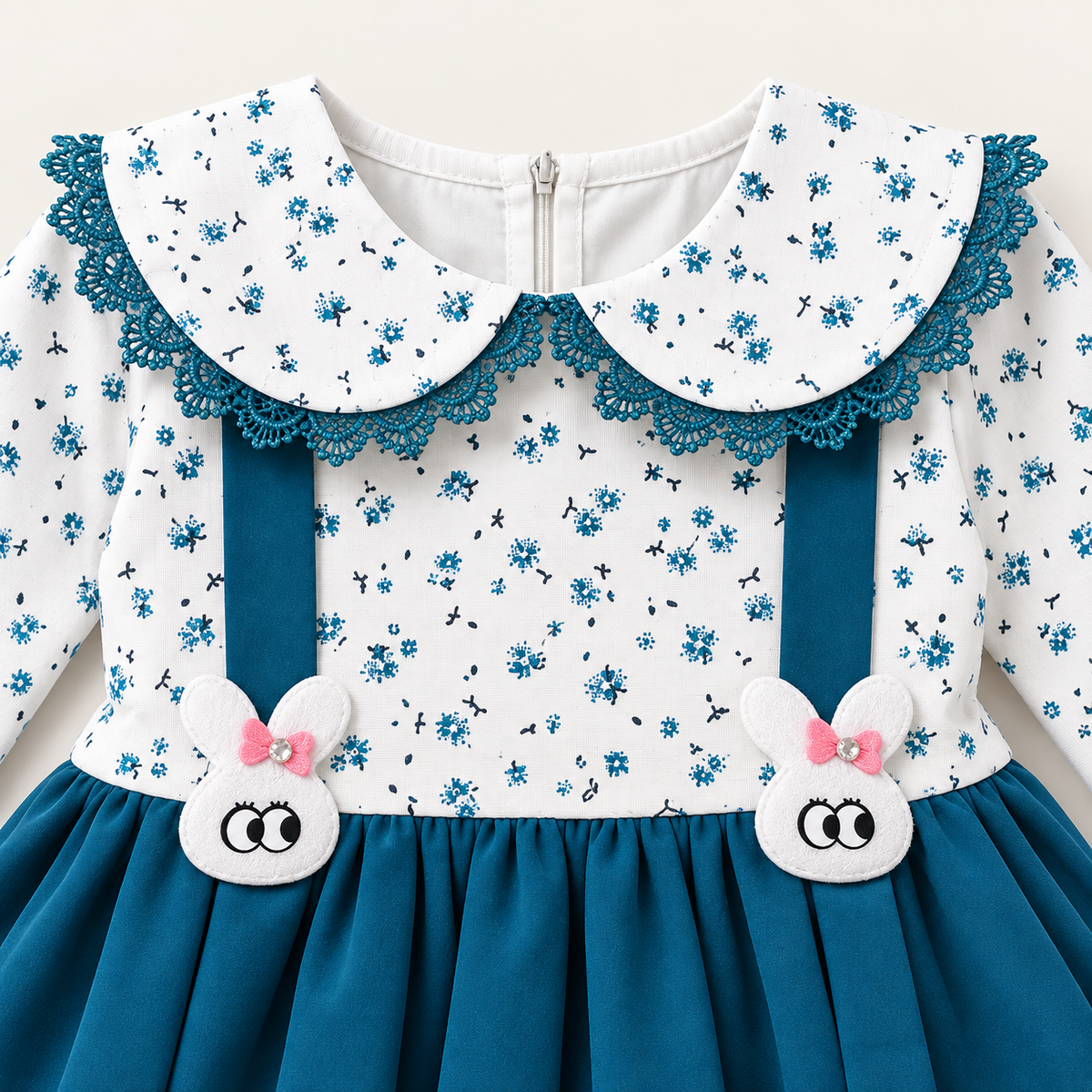 Close-up detail of teal floral bunny dress with lace collar and bunny appliques
