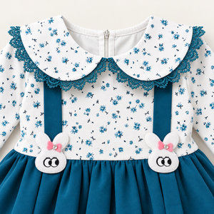 Close-up detail of teal floral bunny dress with lace collar and bunny appliques